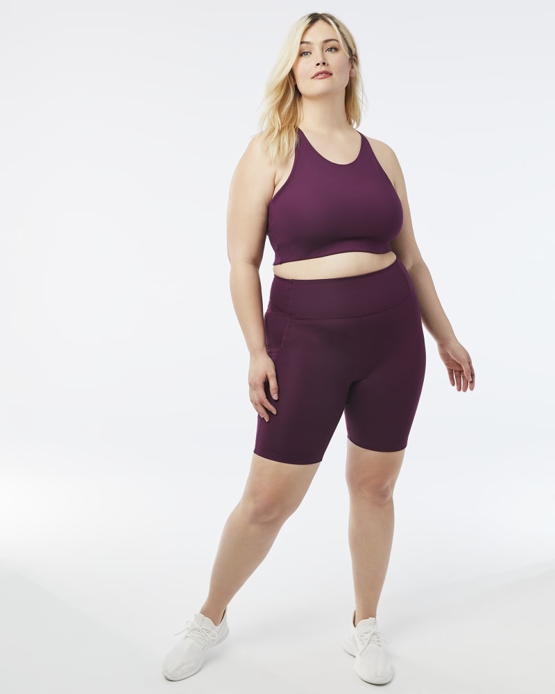 Plus size model with hourglass body shape wearing Genna Sports Bra by Girlfriend Collective | Dia&Co | dia_product_style_image_id:157464